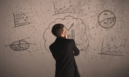 Businessman drawing a business project on a wallの写真素材