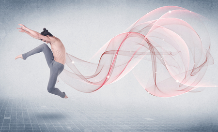 Dancing ballet performance artist with abstract swirl concept on backgroundの写真素材