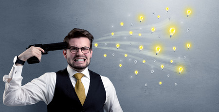Concept of businessman shooting out ideasの写真素材