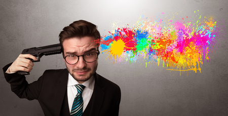 Concept of businessman frustrated with colors and creativityの写真素材