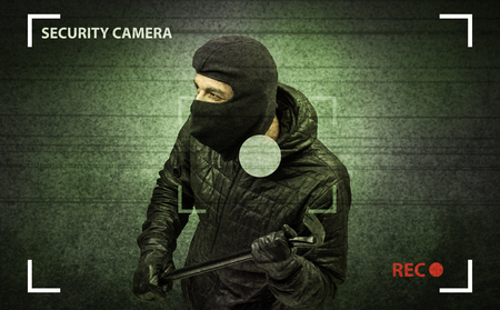 Caught burglar by house camera in action.の写真素材