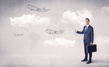 Businessman hitchhiking with flying airplanes cloud and map concept
の写真素材