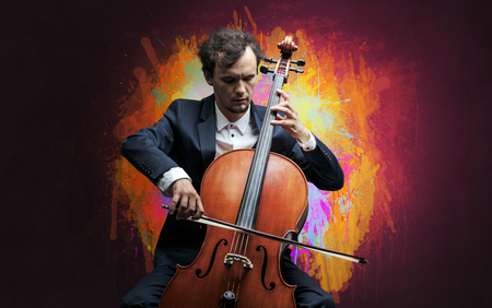 Young classical musician with colorful splotch wallpaper
の写真素材