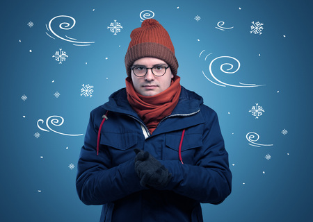 Frozen boy with doodled snowflake and windy conceptの写真素材