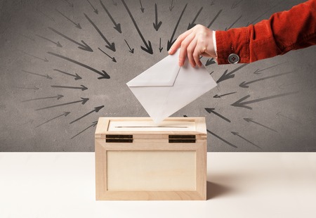 close up of a ballot box and casting vote on grungy backgroundの写真素材