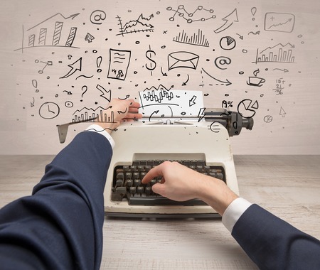 Typewriter with doodles, idea, message, plane, car balloon social media concept
の写真素材