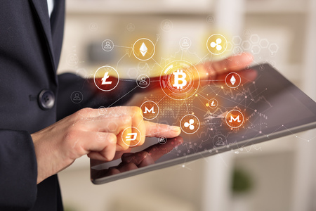 Business woman using tablet with cryptocurrency bitcoin link network concept
の写真素材