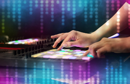 Hand mixing music on dj controller with social media concept icons
の写真素材