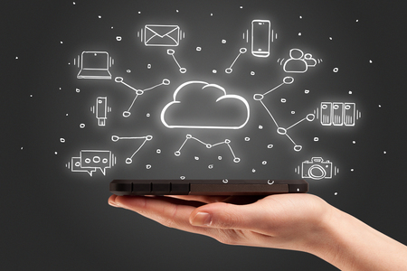 Hand working on phone with cloud technology system conceptの写真素材