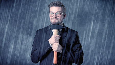 Employer standing with tool on his hand