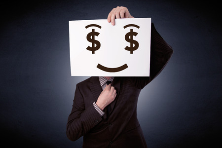 Businessman holding paper with greedy emotionの写真素材