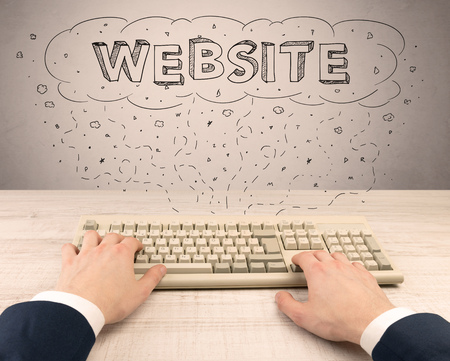 Elegant businessman hand working on internetの写真素材