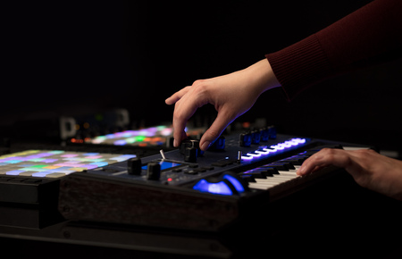 Hand mixing music on midi controllerの写真素材