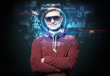 Young man on dark background, face recognition concept