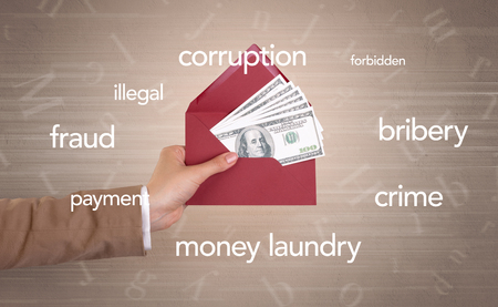 Hand holding envelope with words aroundの写真素材