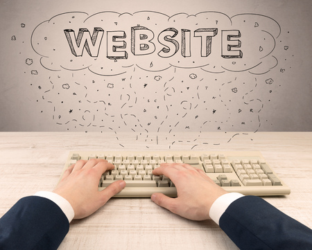 Elegant businessman hand working on internetの写真素材