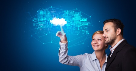 Man and woman touching cloud system hologramの写真素材