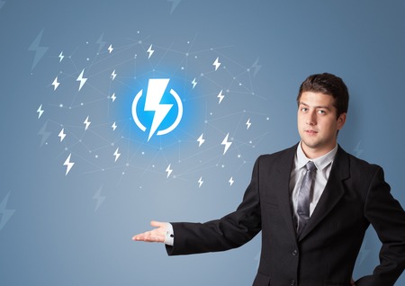 Person presenting battery life conceptの写真素材