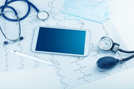 Medicine and modern technology concept with copyspace on tabletの写真素材