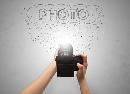 Hand photo shooting with message cloud conceptの写真素材