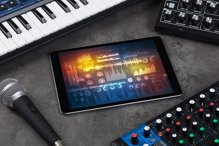Electronic music instruments and tablet with reports conceptの写真素材