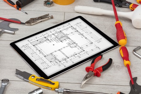 Tablet and tools with blueprint concept