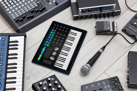 Piano app on tablet and musical instrument conceptの写真素材