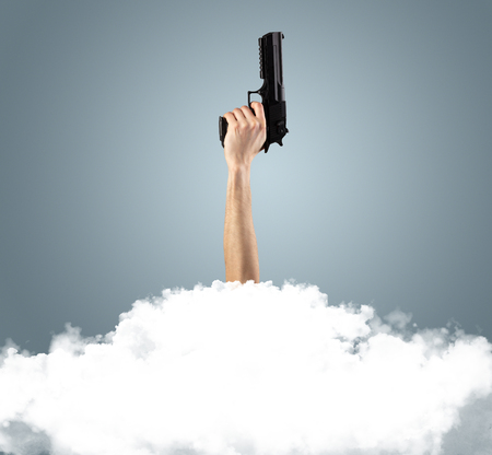Hand buried into cloudの写真素材