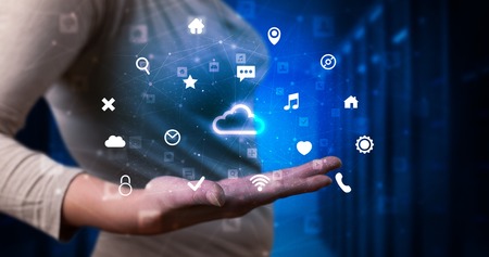 Person holding cloud system hologram screenの写真素材