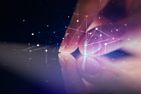 Finger touching tablet with network conceptの写真素材