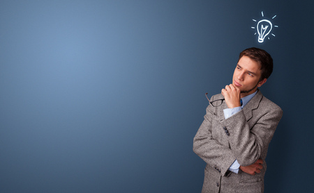 Young student looking for new ideaの写真素材