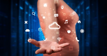Person holding hologram screen displaying information from cloud technology
