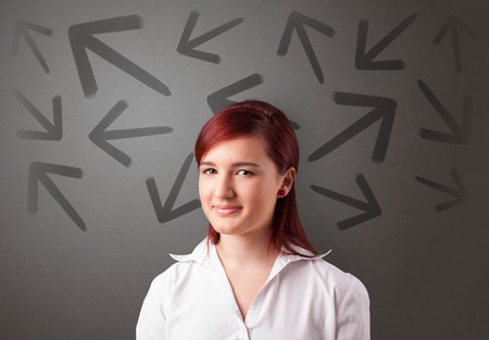 Business person choosing between two directionsの写真素材