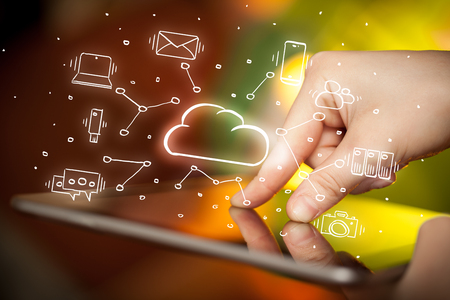Hand working with cloud technology system and office symbol conceptの写真素材