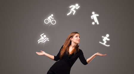 Young student juggle with sports conceptの写真素材