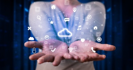 Person holding hologram screen displaying information from cloud technology