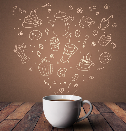 Steaming hot drink decorated with doodle drawingsの写真素材