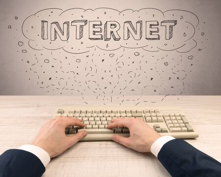 First person view of hand  working on internet and creating websiteの写真素材