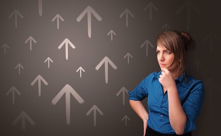 Young person thinking with direction concept backgroundの写真素材