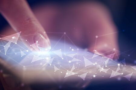Finger touching phone with human network concept and dark background