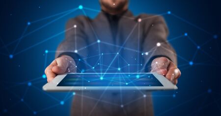 Formal hand in a dark space with virtual connection network conceptの写真素材