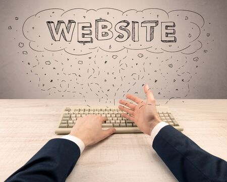 First person view of hand working on internet and creating websiteの写真素材