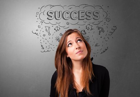 Young pretty person looking forward to successの写真素材