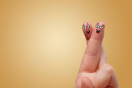 Happy face fingers hug each otherの写真素材