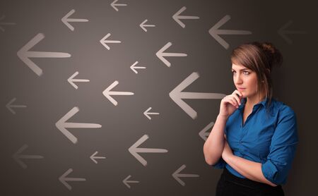 Young person thinking with direction concept backgroundの写真素材