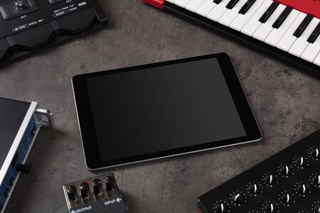 Empty tablet and electronic music instrumentsの写真素材