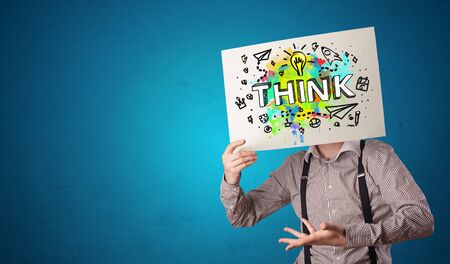 Young person holding paper with design thinking conceptの写真素材