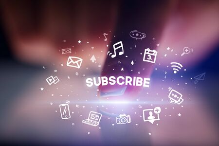 Finger touching tablet with drawn social media icons and SUBSCRIBE inscription, social networking conceptの写真素材