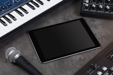 Empty tablet and electronic music instrumentsの写真素材