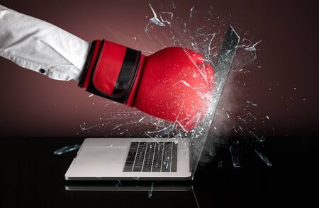 Strong arm boxing laptop screen stronglyの写真素材